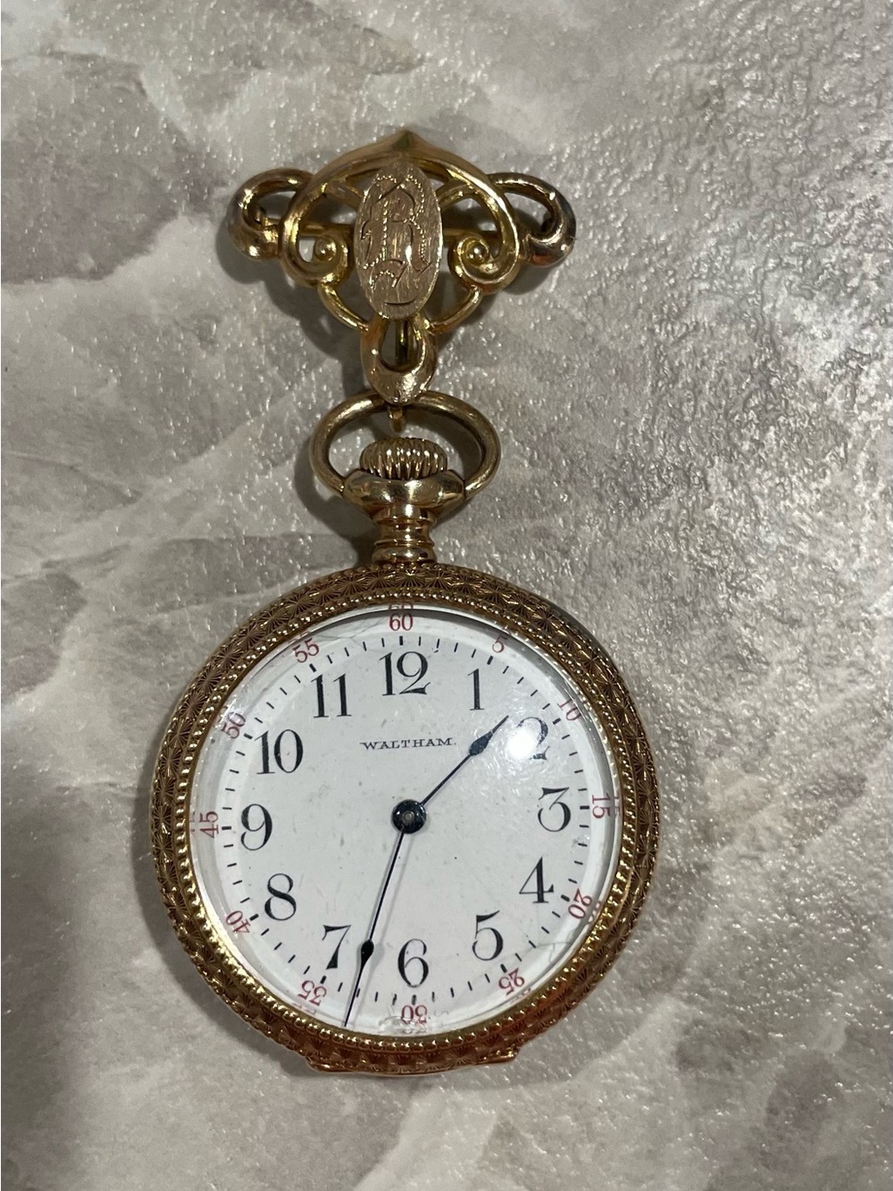 American Waltham 14k pocket watch. Monogram engraved with matching brooch.